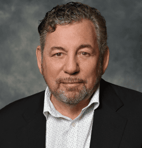 Professional headshot of James Dolan, Executive Chairman and CEO of Madison Square Garden Entertainment